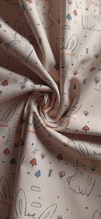 Retal de algodón estampado conejos fondo crema - 1,00 x 1,40 m