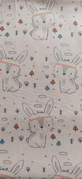 Retal de algodón estampado conejos fondo crema - 1,00 x 1,40 m