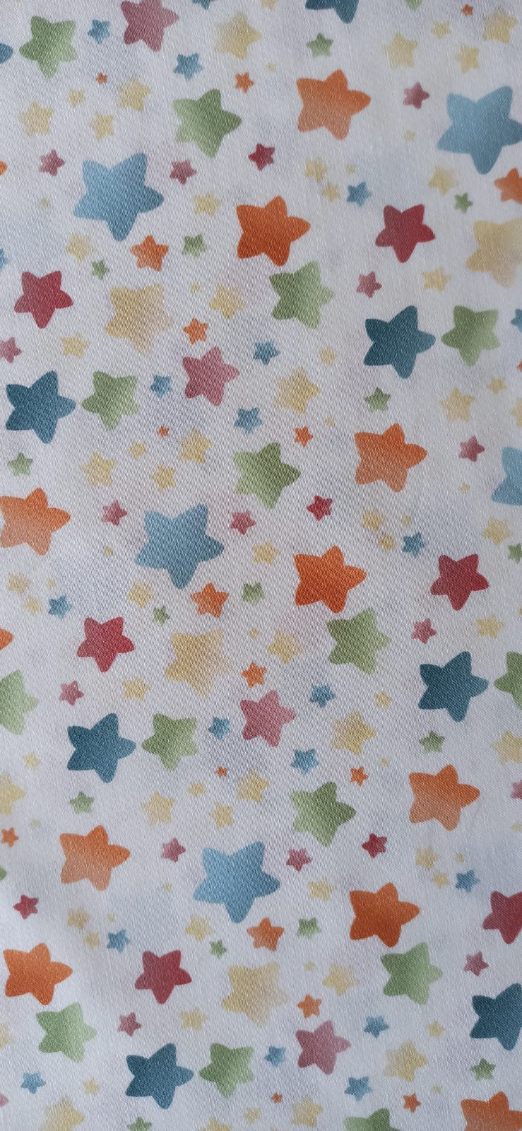 Algodón estrellas multicolor rollo