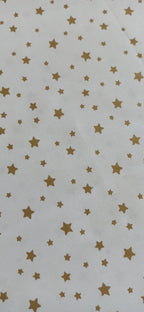 Retal de algodón estampado estrellas doradas - 0,75 x 1,20 m