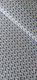 Algodón 100% con estampado de flores mini azules sobre fondo blanco · Las telas de la tata