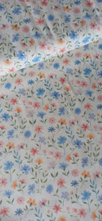 Algodón flores tricolor azul rosa y naranja fondo blanco 1,40 m