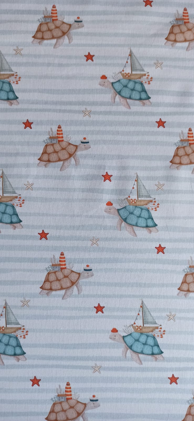 Estampado de tortugas marinas y rayas azules