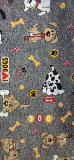 Estampado de la loneta Perritos y Huesos en fondo gris jaspeado con la palabra DOG, huesos y un dálmatas
