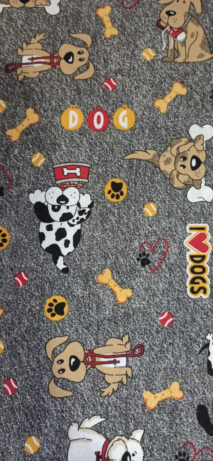 Estampado de la loneta Perritos y Huesos en fondo gris jaspeado con la palabra DOG, huesos y un dálmatas