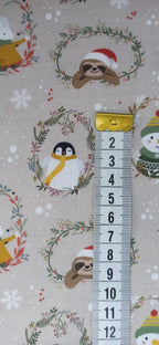 Estampado de Animalitos de Navidad con cinta métrica para mostrar la escala