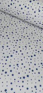 Tela de algodón blanco con estrellas azul marino de distintos tamaños, vista extendida